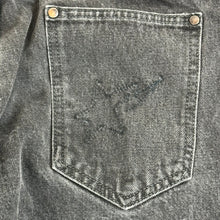 Load image into Gallery viewer, late 2000s bape made by human patch black slim jeans