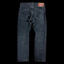 Load image into Gallery viewer, late 2000s bape made by human patch black slim jeans