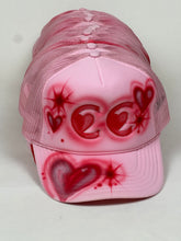 Load image into Gallery viewer, cc heart eyes hat by jimmy guiterrez
