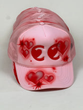 Load image into Gallery viewer, cc heart eyes hat by jimmy guiterrez