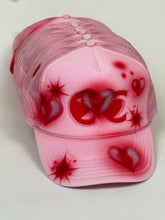 Load image into Gallery viewer, cc heart eyes hat by jimmy guiterrez