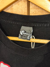 Load image into Gallery viewer, 2000s famous stars &amp; straps drip spellout tee
