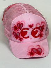 Load image into Gallery viewer, cc heart eyes hat by jimmy guiterrez
