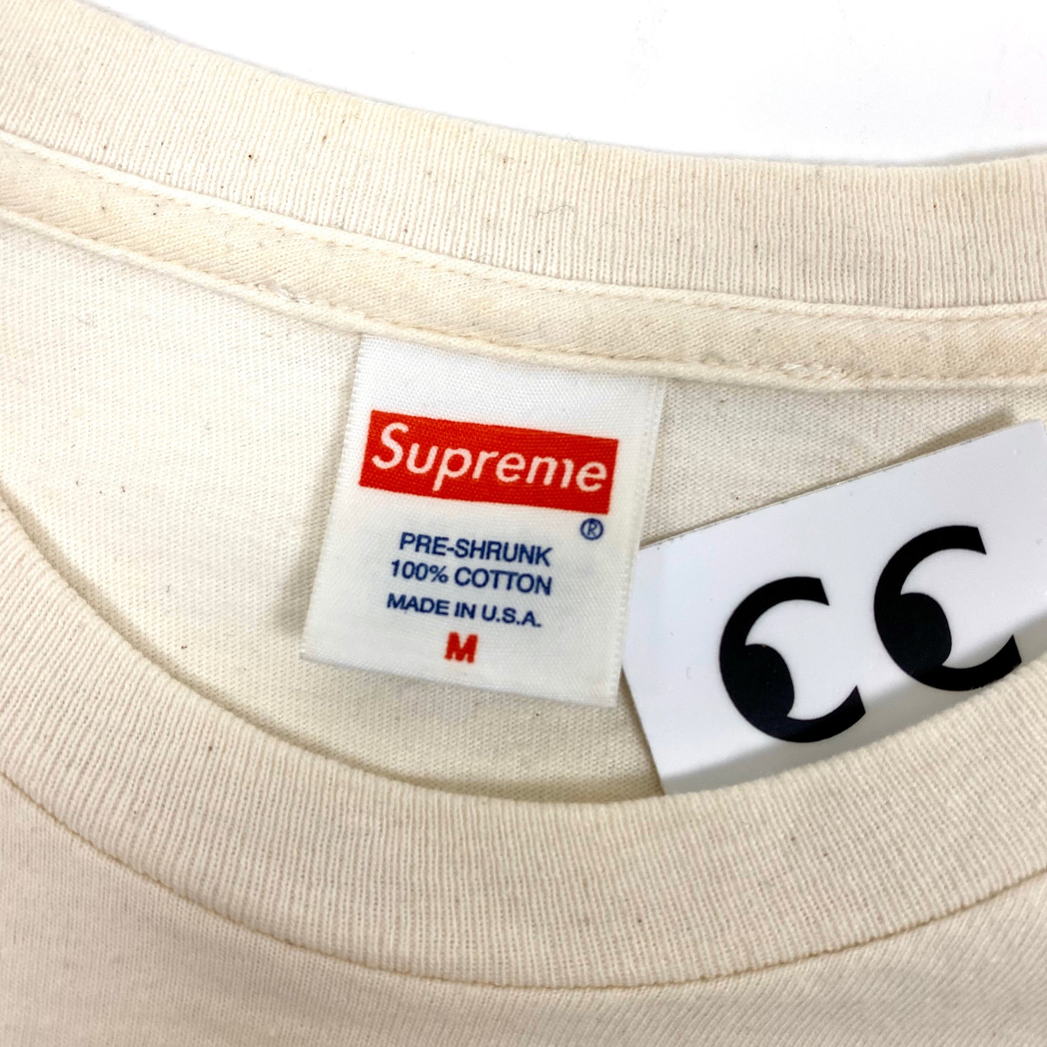 Supreme Unamerican Tee – change clothes